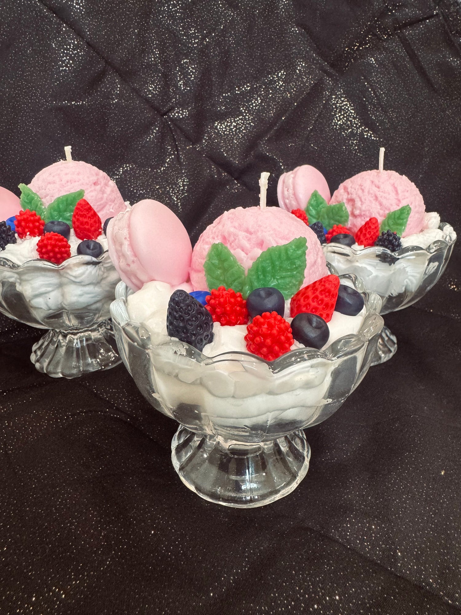 Sundae candle with whipped cream and berries